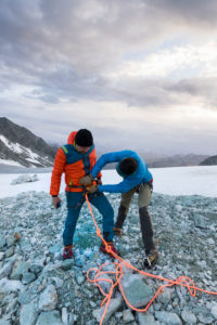 Mountaineers on the way to the Bishorn summit, rope in for safety on the glacier Mountaineers on the way to the Bishorn summit, rope in for safety on the glacier